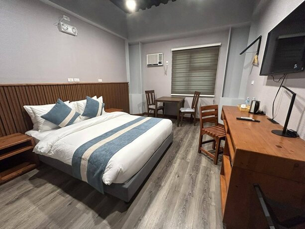 Imagen de la habitación del Hotel Kekehyu Business. Foto 13