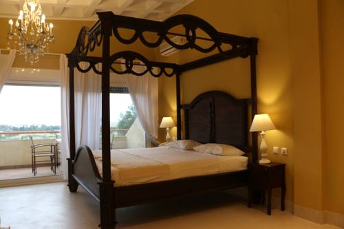 Imagen de la habitación del Hotel Kelyfos Bungalows and Suites. Foto 2