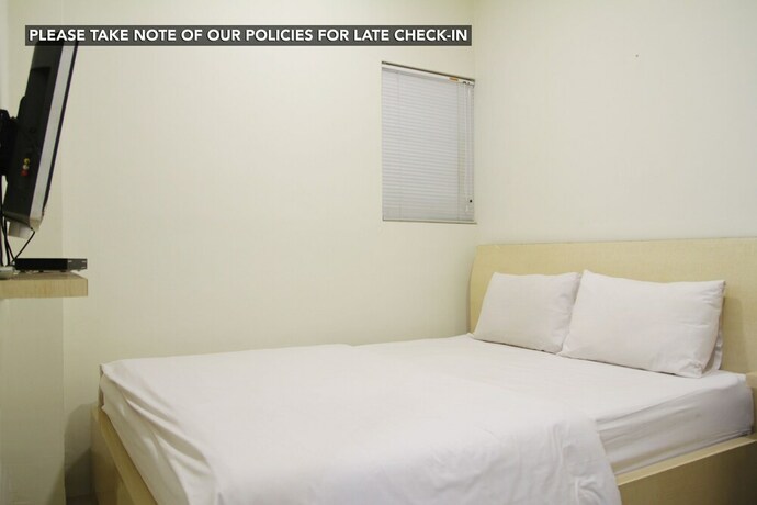 Imagen de la habitación del Hotel Kemang Eleven. Foto 17