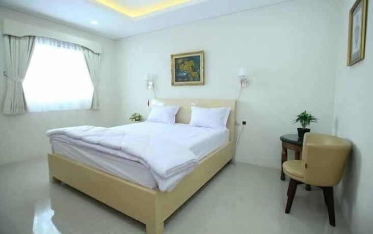 Imagen de la habitación del Hotel Kemang Eleven. Foto 19