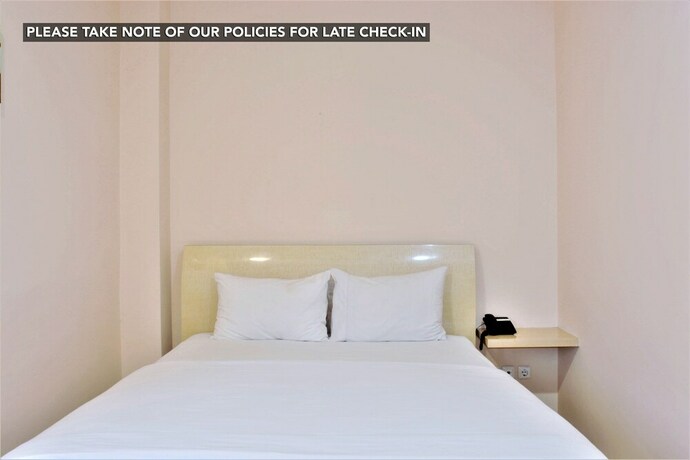 Imagen de la habitación del Hotel Kemang Eleven. Foto 25