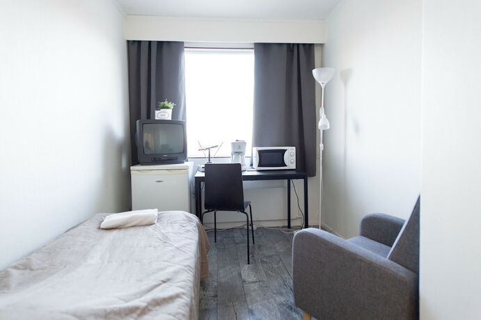 Imagen de la habitación del Hotel Kempeleen Moottorimaja. Foto 16