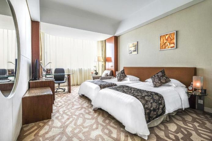 Imagen de la habitación del Hotel Kempinski Chengdu. Foto 14