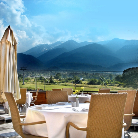 Imagen del bar/restaurante del Hotel Kempinski Grand Arena. Foto 2