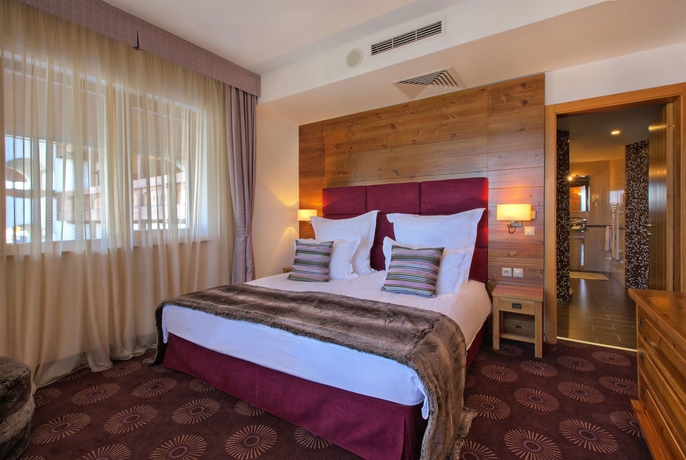 Imagen de la habitación del Hotel Kempinski Grand Arena. Foto 7