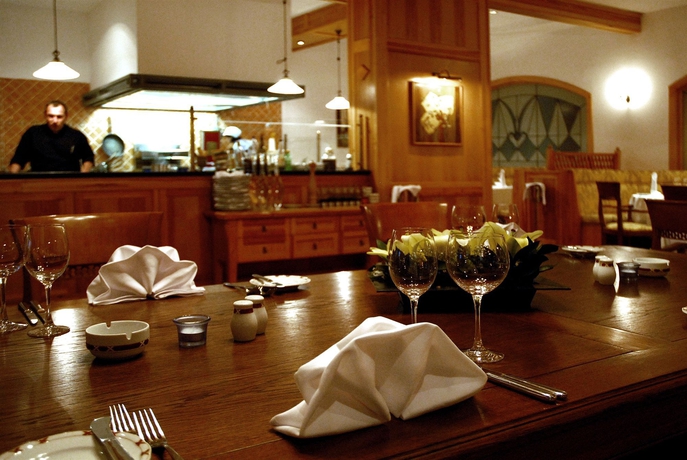 Imagen del bar/restaurante del Hotel Kempinski Grand Arena. Foto 3