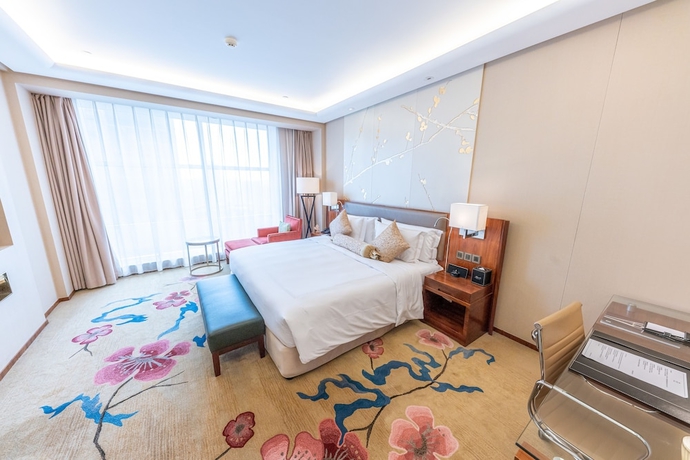 Imagen de la habitación del Hotel Kempinski Huizhou. Foto 7