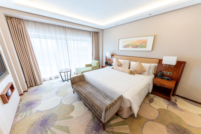 Imagen de la habitación del Hotel Kempinski Huizhou. Foto 13