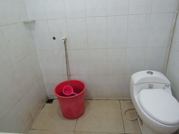 Imagen de la habitación del Hotel Kencana Jaya. Foto 7