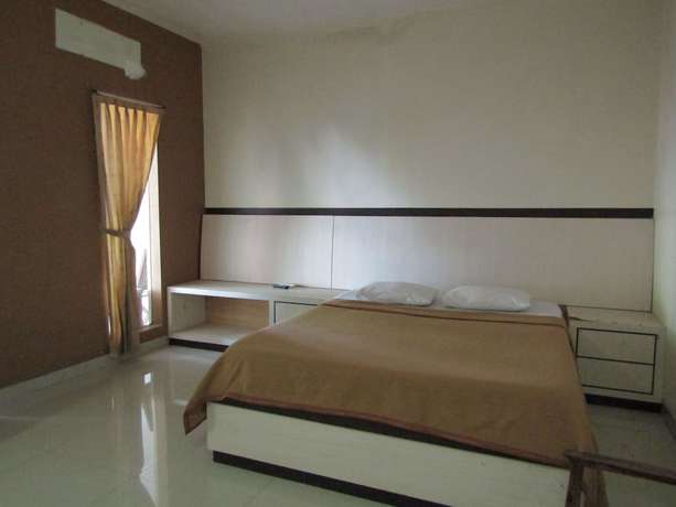 Imagen de la habitación del Hotel Kencana Jaya. Foto 8
