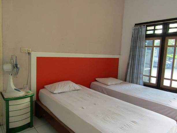 Imagen de la habitación del Hotel Kencana Jaya. Foto 14
