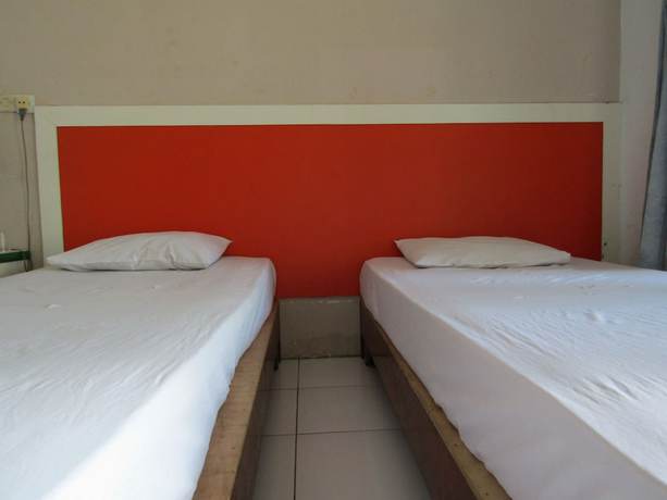 Imagen de la habitación del Hotel Kencana Jaya. Foto 15