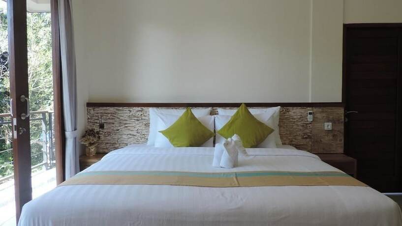 Imagen de la habitación del Hotel Kencana Ubud. Foto 19