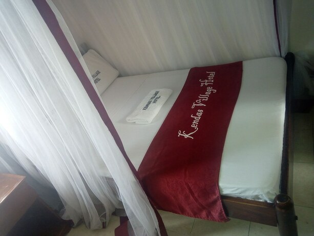 Imagen de la habitación del Hotel Kendas Village. Foto 9