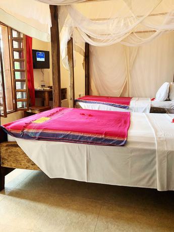 Imagen de la habitación del Hotel Kendwa Rocks Beach. Foto 16