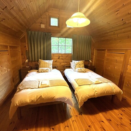Imagen de la habitación del Hotel Kenman House Hakuba. Foto 20