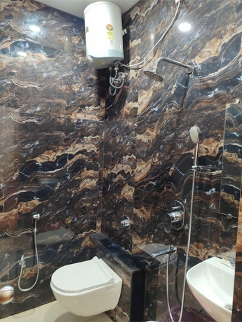 Imagen de la habitación del Hotel Kennedia International And Suites. Foto 12