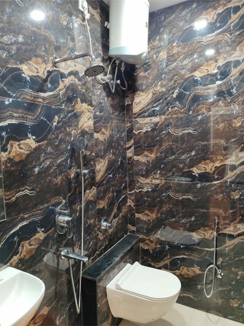 Imagen de la habitación del Hotel Kennedia International And Suites. Foto 13