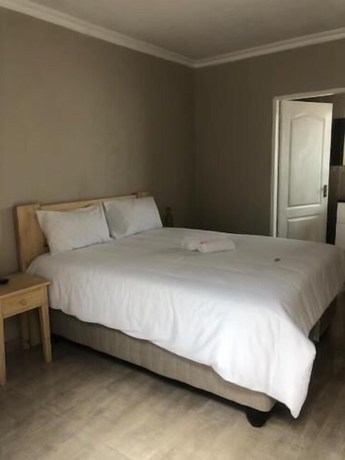 Imagen de la habitación del Hotel Kennzy Guesthouse. Foto 1