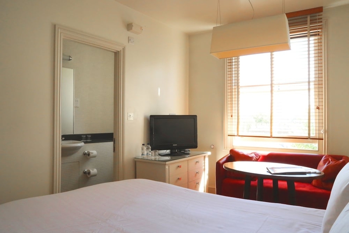 Imagen de la habitación del Hotel Kensington House. Foto 7