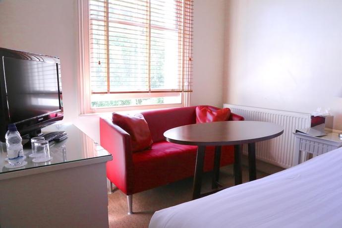 Imagen de la habitación del Hotel Kensington House. Foto 8