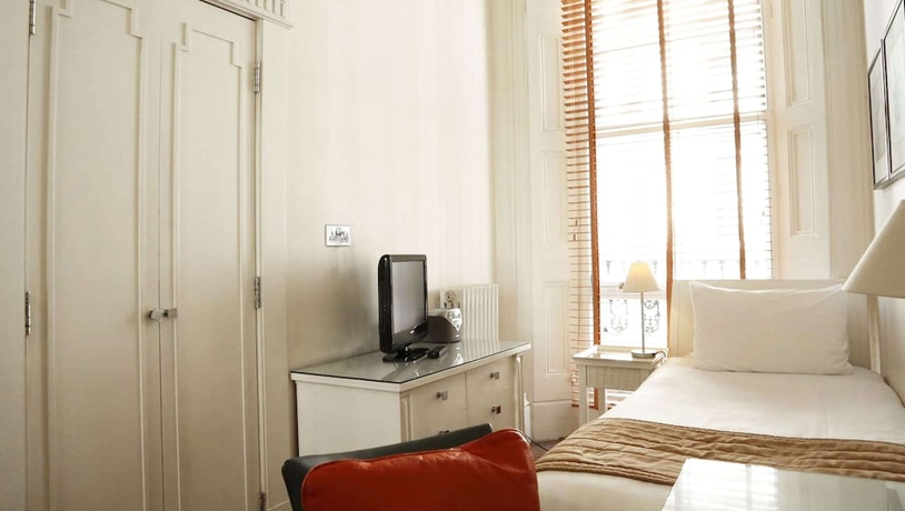 Imagen de la habitación del Hotel Kensington House. Foto 16