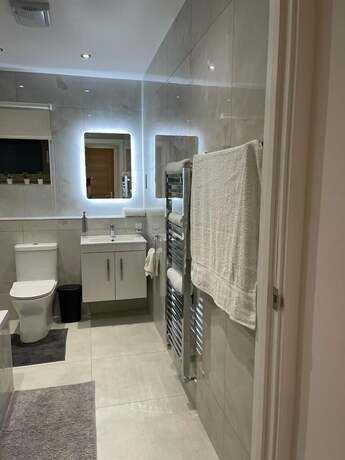 Imagen de la habitación del Hotel Kensington House by Solitaire Suites. Foto 8