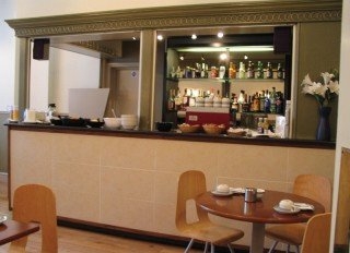 Imagen del bar/restaurante del Hotel Kensington International. Foto 3