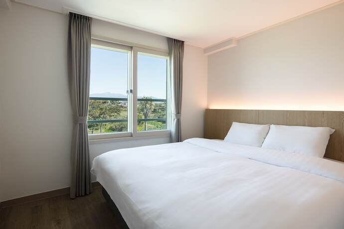 Imagen de la habitación del Hotel Kensington Resort Jeju Hanlim. Foto 15