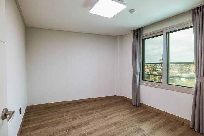 Imagen de la habitación del Hotel Kensington Resort Jeju Hanlim. Foto 16
