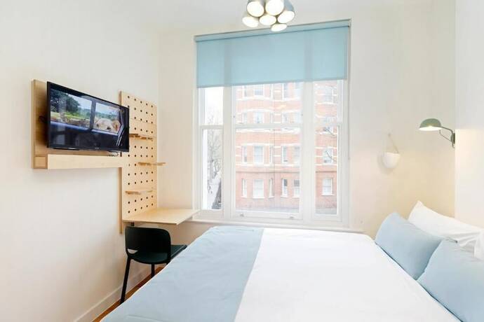 Imagen de la habitación del Hotel Kensington Stay. Foto 10