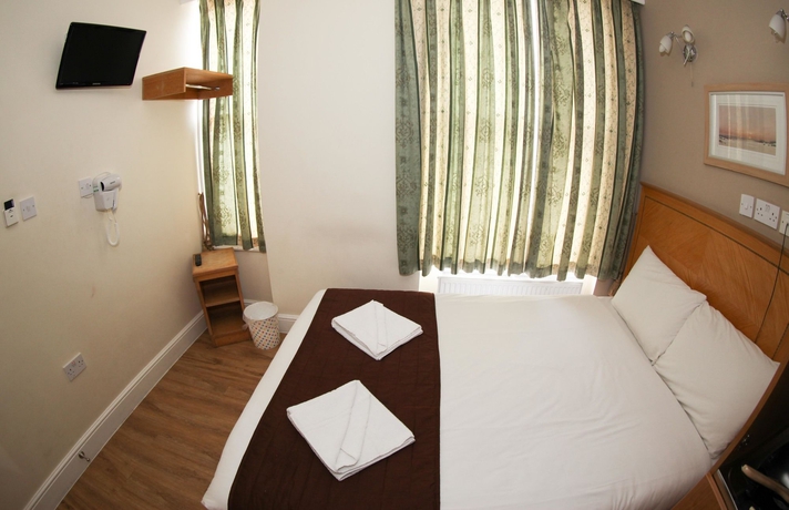 Imagen de la habitación del Hotel Kensington Suite. Foto 13