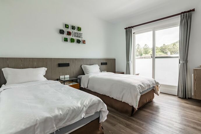 Imagen de la habitación del Hotel Kenting Fairyland and Farm Guest House. Foto 12