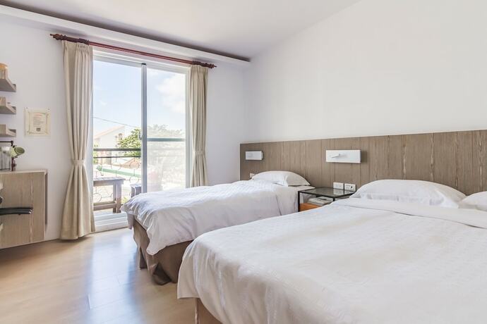 Imagen de la habitación del Hotel Kenting Fairyland and Farm Guest House. Foto 15