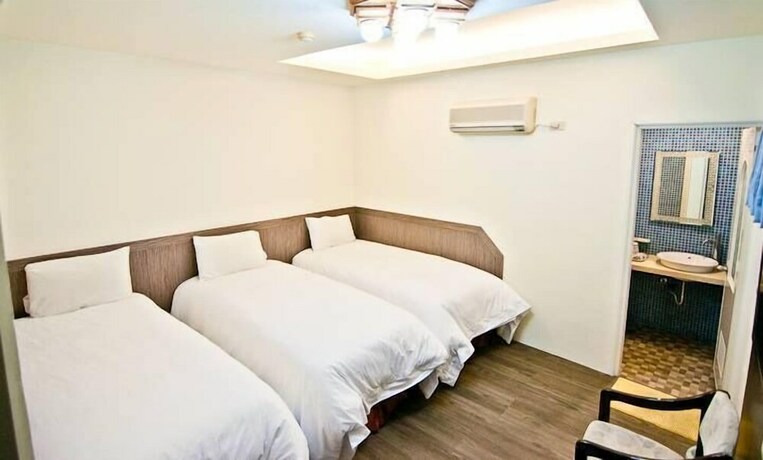 Imagen de la habitación del Hotel Kenting Jinjin Music Inn. Foto 34