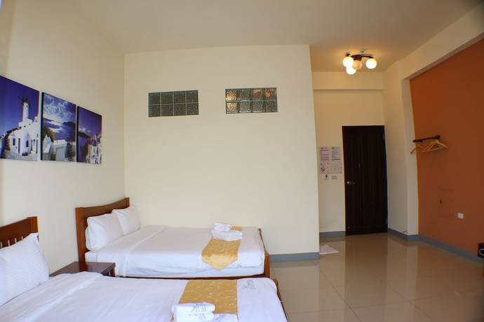 Imagen de la habitación del Hotel Kenting Muchen Inn. Foto 11