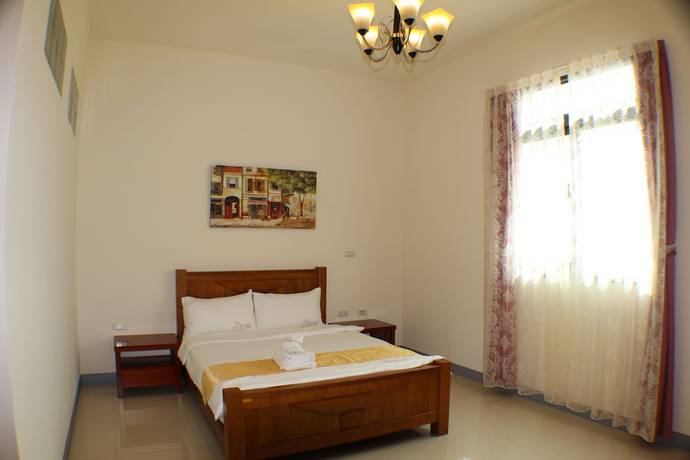 Imagen de la habitación del Hotel Kenting Muchen Inn. Foto 12