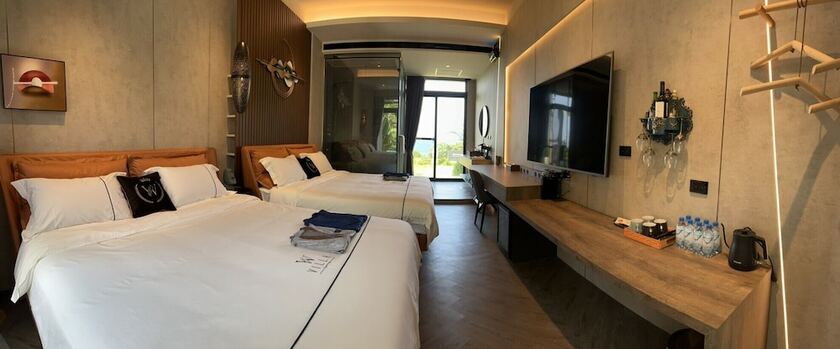 Imagen de la habitación del Hotel Kenting Sand Island W-Villa Seaview Resort. Foto 16