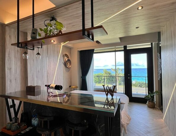 Imagen de la habitación del Hotel Kenting Sand Island W-Villa Seaview Resort. Foto 18
