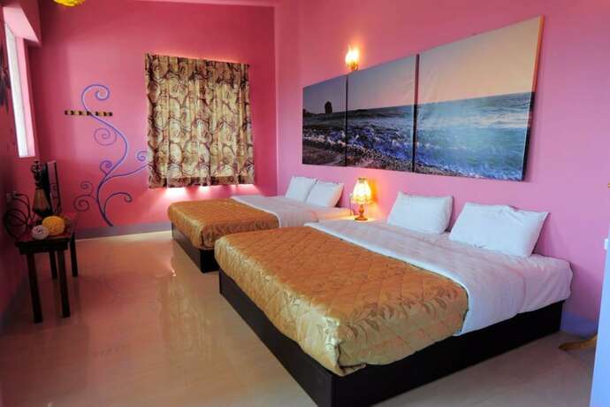 Imagen de la habitación del Hotel Kenting Xinjing Huiguan. Foto 3