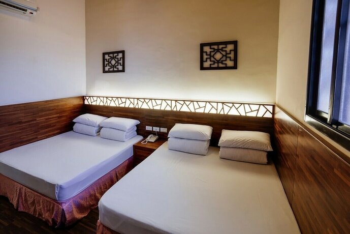 Imagen de la habitación del Hotel Kenting Youth Activity Center. Foto 17