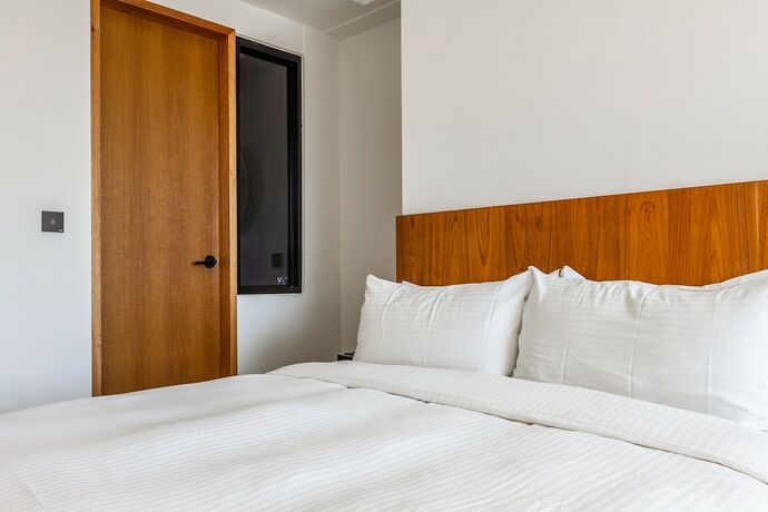 Imagen de la habitación del Hotel Kenting seawall Inn 112. Foto 11