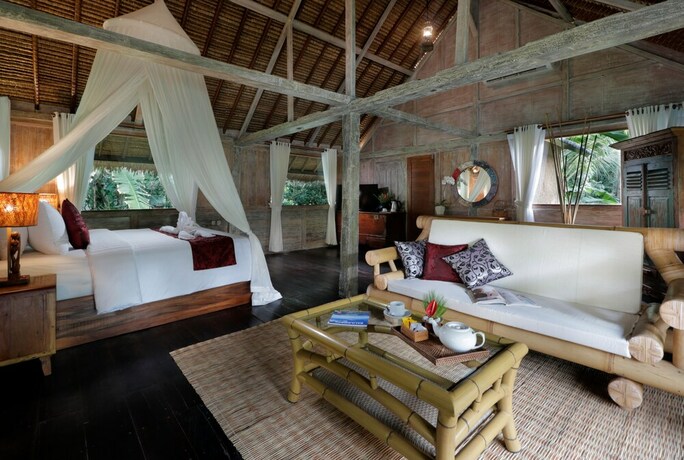 Imagen de la habitación del Hotel Keramas Sacred River Village. Foto 12