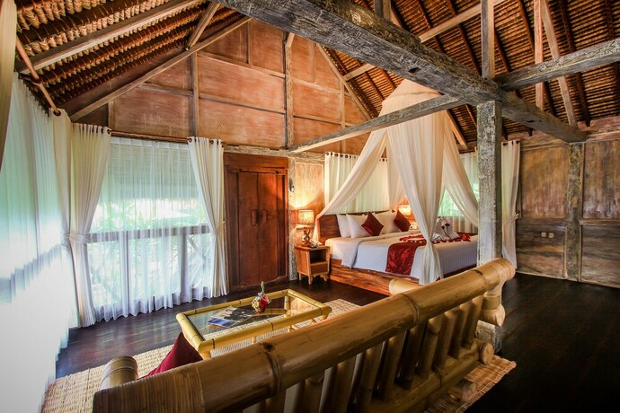 Imagen de la habitación del Hotel Keramas Sacred River Village. Foto 13