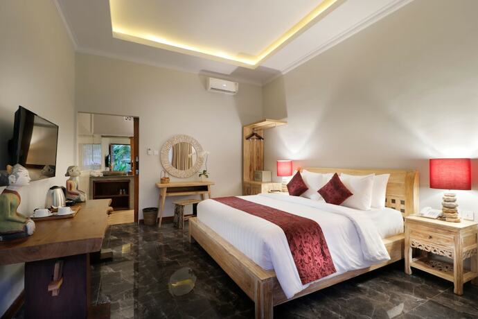 Imagen de la habitación del Hotel Keramas Sacred River Village. Foto 14