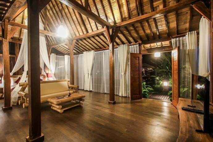 Imagen de la habitación del Hotel Keramas Sacred River Village. Foto 15