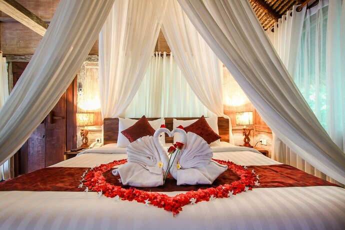 Imagen de la habitación del Hotel Keramas Sacred River Village. Foto 16