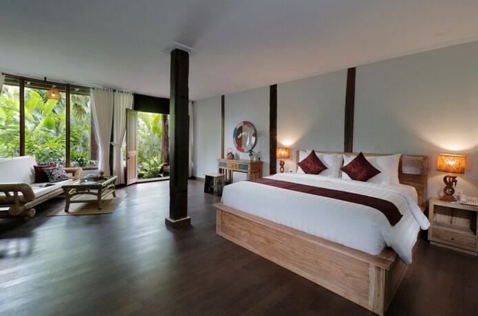 Imagen de la habitación del Hotel Keramas Sacred River Village. Foto 17