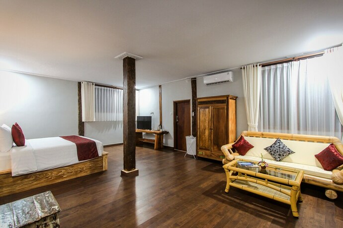 Imagen de la habitación del Hotel Keramas Sacred River Village. Foto 18