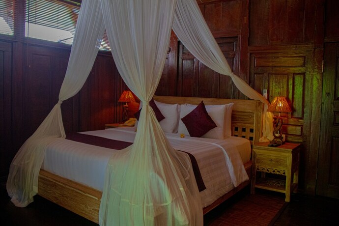 Imagen de la habitación del Hotel Keramas Sacred River Village. Foto 19